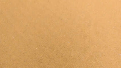 Background of brown kraft paper or cardboard texture. Brown recycled paper texture background.