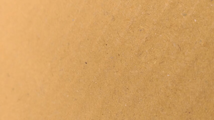 Background of brown kraft paper or cardboard texture. old paper sheet, parchment or papyrus surface.