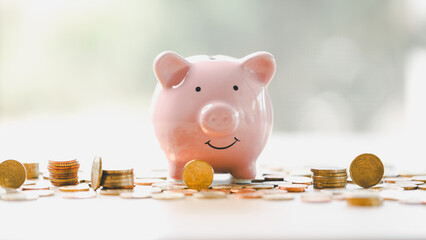 Money box filled with coins, saving cash, banking wisely, making sound investments can build...