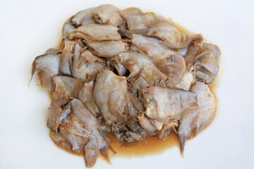 Pickled fish, Fish fermented against white background. Traditional Thai style raw preserved fish thai call Pla-ra.