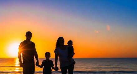 Silhouette family mother, father and young son holding hands.