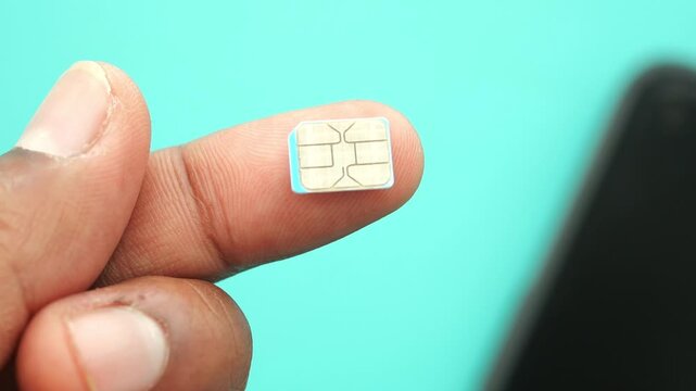 How to insert a SIM card into a smartphone