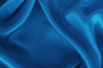 Blue fabric cloth texture for background and design art work, beautiful crumpled pattern of silk or linen.
