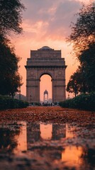 Obraz premium Monumental archway at sunset, reflected in puddle