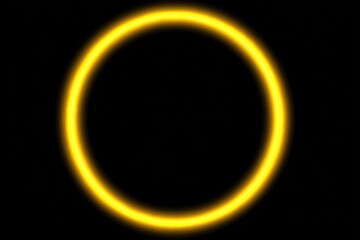 Glowing yellow circle on black background