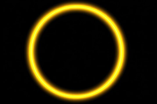 Glowing yellow circle on black background