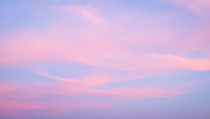 The sky is tinged with soft pastel colors, a mix of pink, purple, and blue.