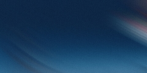 A peaceful blue sky is subtly blurred with hints of light, creating a dreamy and abstract atmospheric background