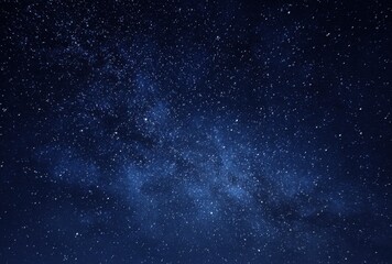 Obraz premium Clear night sky filled with countless stars and a faint glimpse of the Milky Way