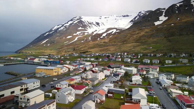 Aerial view of Olafsfjordur town in northern Iceland in spring time.
