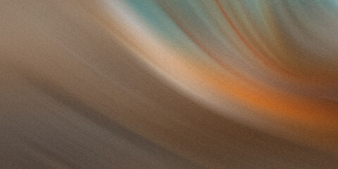 A blurred abstract background with a gradient of brown, orange, and blue creates a sense of depth...