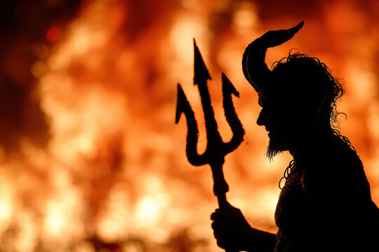 The devil /Satan with trident in the fire
