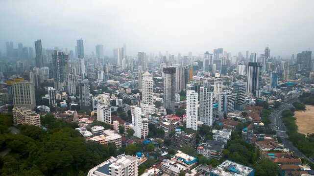 Aerial view of Mumbai cityscape with many skyscrapers view from Hanging Gardens, Malabar Hills, Mumbai, India.