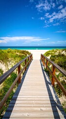 Obraz premium Beach boardwalk path to ocean, sunny day