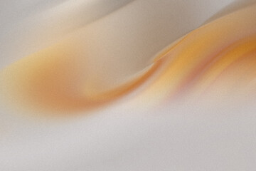 The smooth, golden beige fabric creates a luxurious abstract texture with soft waves and subtle color gradients