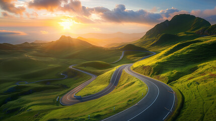 Winding mountain highway at sunrise