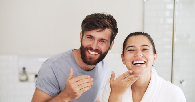 Portrait, skincare and couple in bathroom, smile and cleaning with grooming, care and wellness. Treatment, home and man with woman, happiness or healthy skin with beauty, cosmetics or morning routine - Powered by Adobe