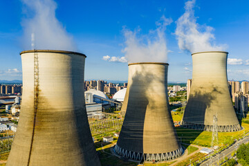 Thermal power plant under blue sky and white clouds
