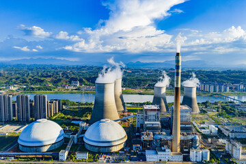 Thermal power plant under blue sky and white clouds