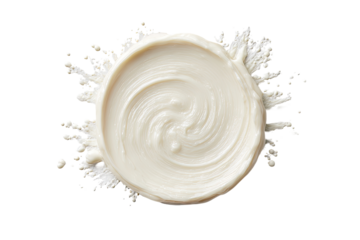 Creamy white substance in a circular, swirling pattern, surrounded by splashes