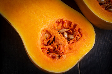 Butternut squash on a dark wooden background