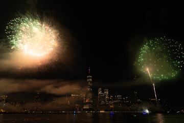 New York Manhattan fireworks. New York Fireworks over Manhattan. New York City 4th of July Fireworks. New York City Skyline Manhattan with Flashing Fireworks. Independence day.