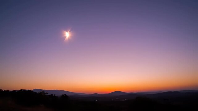 Partial solar eclipse with vibrant sunset sky