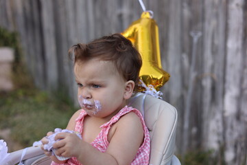 Cute little girl on her first birthday