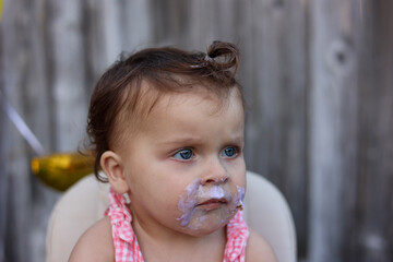 Cute little girl on her first birthday