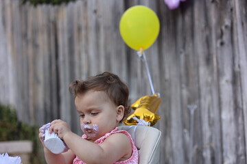 Cute little girl on her first birthday