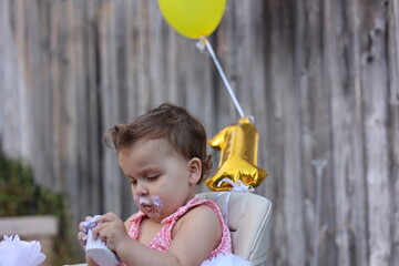 Cute little girl on her first birthday