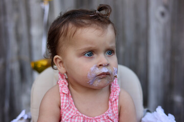 Cute little girl on her first birthday