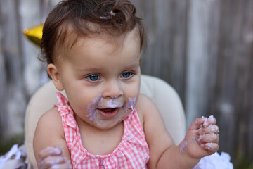 Cute little girl on her first birthday