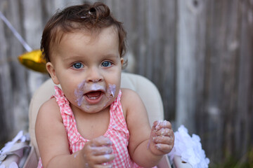 Cute little girl on her first birthday