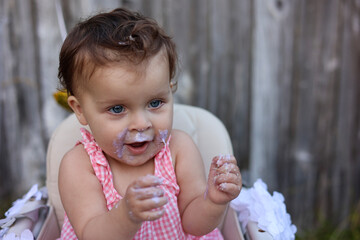 Cute little girl on her first birthday