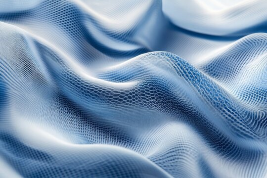 A dynamic, flowing fabric design with a subtle, textured snake-like pattern in a soft blue tone.