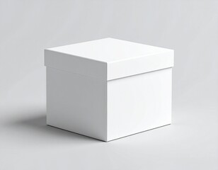 Fototapeta premium Closed white square gift box with a lid, a clean product packaging mockup template on an isolated light gray studio background.