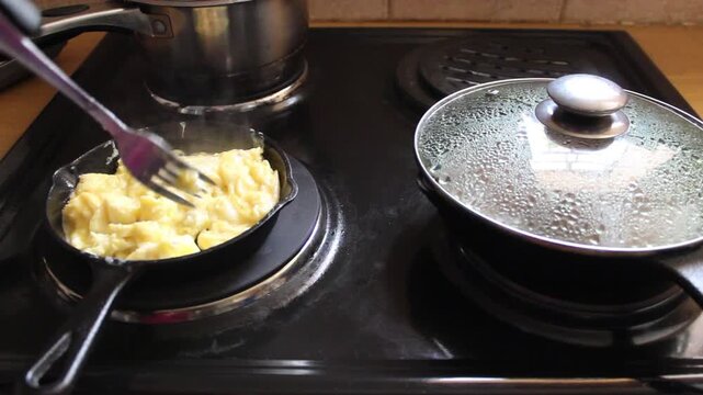 Cooking eggs in a pan