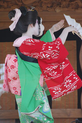 Naklejka premium A woman dancing Japanese dance，wearing 