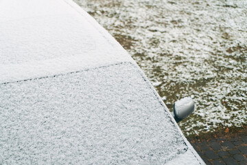 Icy texture on car exterior in winter