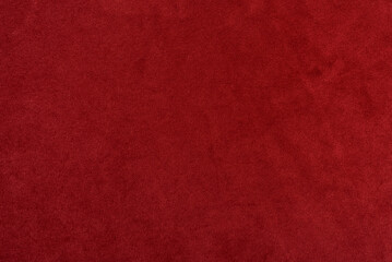 Red velvet fabric texture. Red fabric background of soft and smooth textile material. Fabric texture for design and decoration. Top view.  
