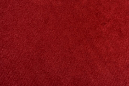 Red velvet fabric texture. Red fabric background of soft and smooth textile material. Fabric texture for design and decoration. Top view.  
 - Powered by Adobe