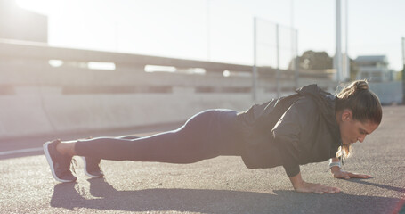 City, push ups and woman on road, fitness or workout routine for core strength, healthy and outdoor. Bodybuilder, wellness and training for muscle power, endurance and exercise for body stability