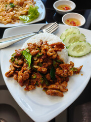 Pork fried rice with curry paste looks delicious and spicy.