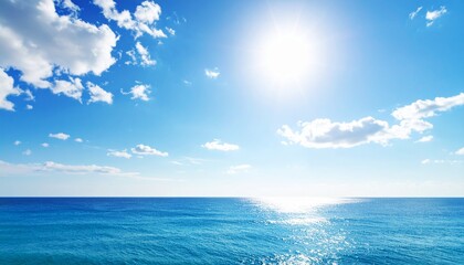 Obraz premium vast ocean, blue sky and sun