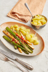 Baked asparagus with potatoes