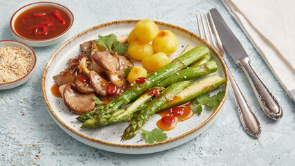 Asparagus with oyster mushrooms and potatoes
