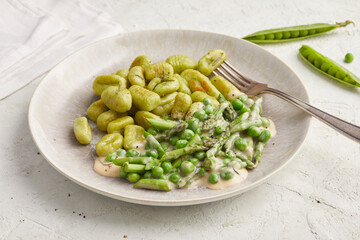 Pea gnocchi with asparagus
