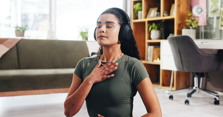 Calm woman, relax and headphones with breathing technique for audio therapy or harmony. Female person, zen or listening with sound healing for inner peace, meditation or mental wellness in home