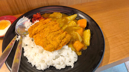 Japanese Chicken Katsu Curry Rice with Potatoes and Carrots Authentic Homemade Comfort Food Dish